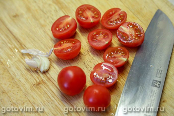 Свиные отбивные, запеченные с помидорами, моццарелой и лимоном